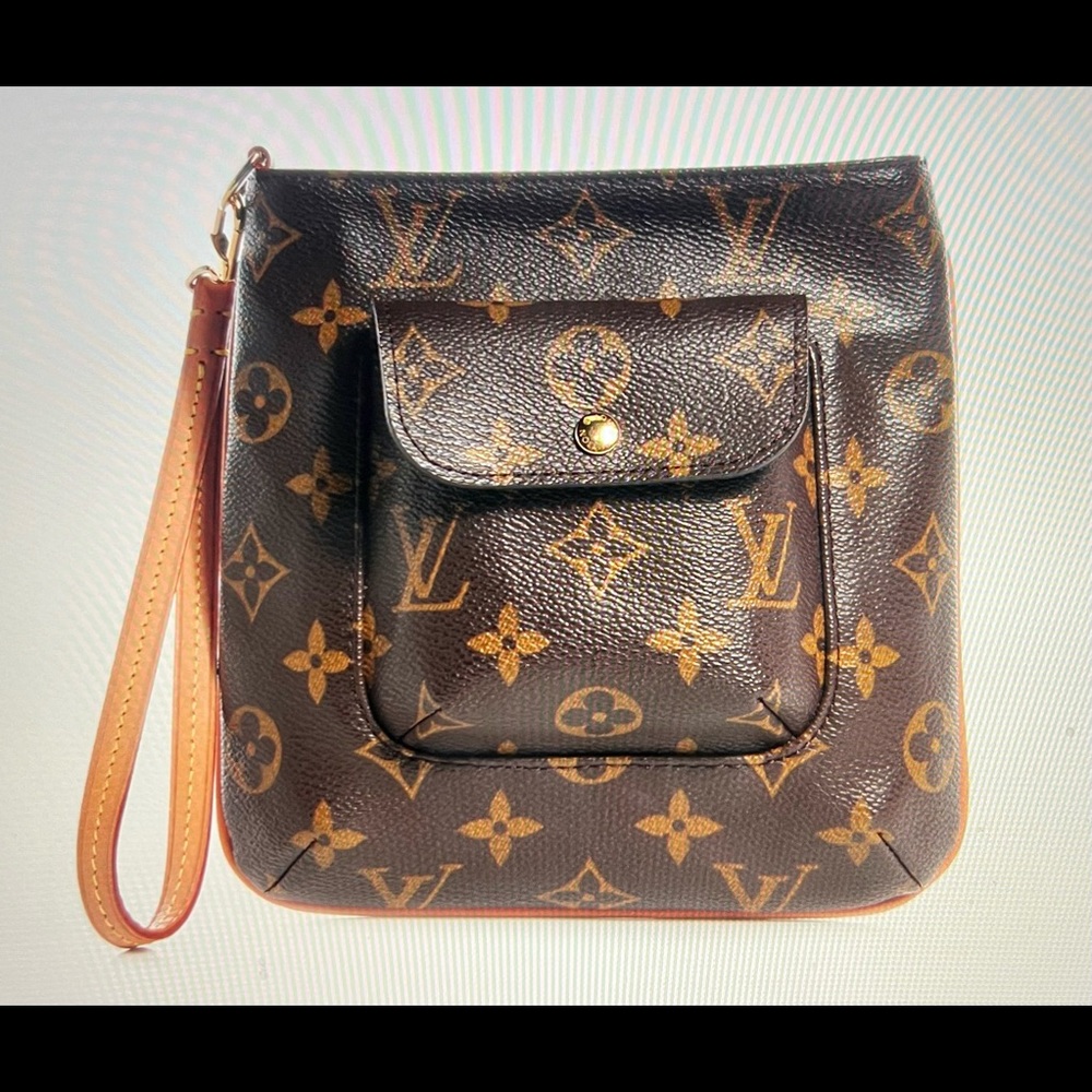 ….SOLD….Louis Vuitton Monogram Partition Clutch